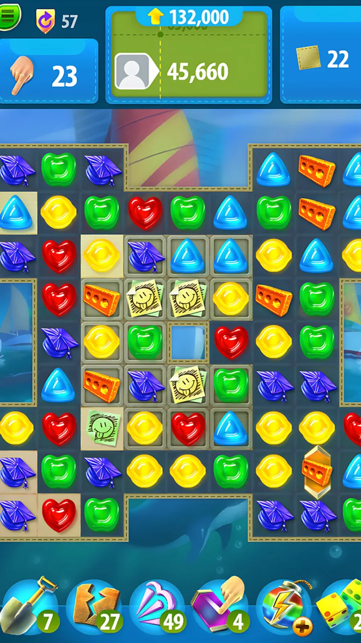 Gummy Drop screenshot showing a match-3 board with city resources